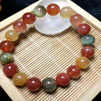 五彩发晶圆形手链 规格11mm 重量 33克 编码 92106767