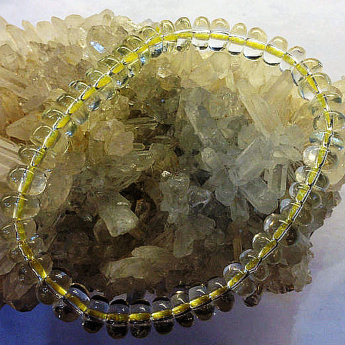 黄晶碟形手链 规格7*4mm 重量 15克 编码 91000481