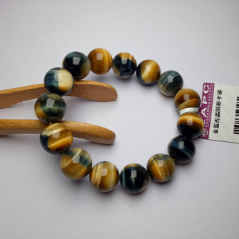 金蓝虎晶圆形手链 规格10mm 重量 28克 编码 82103082