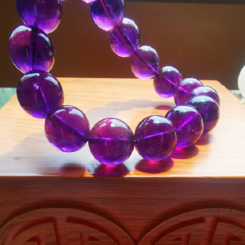 紫晶圆形手链 规格13mm 重量 50克 编码 82102589