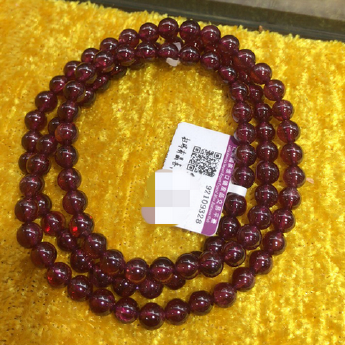 石榴石圆形手串 规格5.5/ 重量 37.5克 编码 92109328