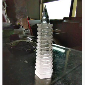 白晶文昌塔摆件 规格高23.8*6.8cm 重量 1.148千克 编码 92108846